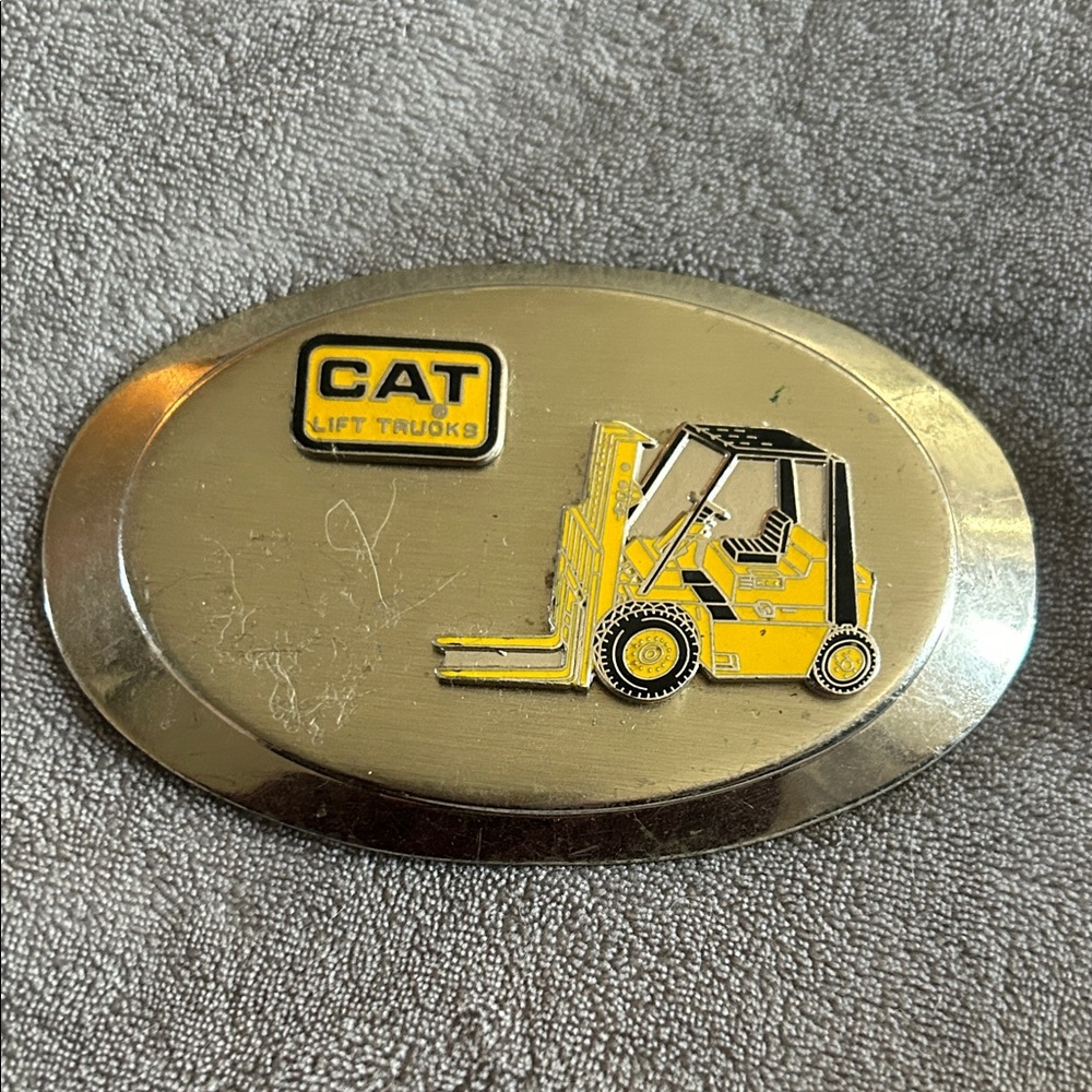 Vintage Caterpillar Yellow and Silver Belt Buckle
